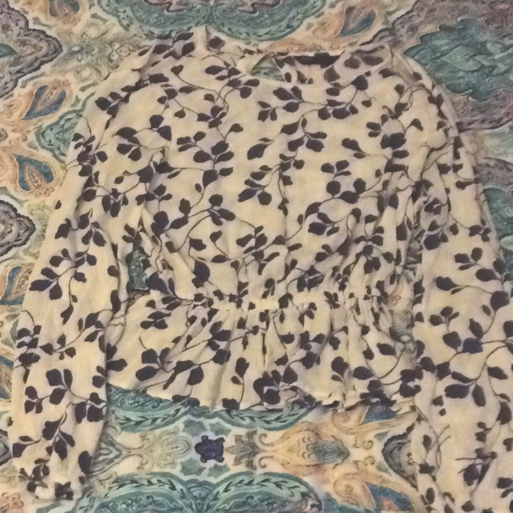 White and blue long sleeved top